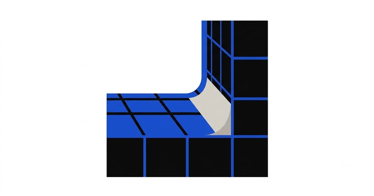 A cement grout joint beside a flexible sealant joint at a corner